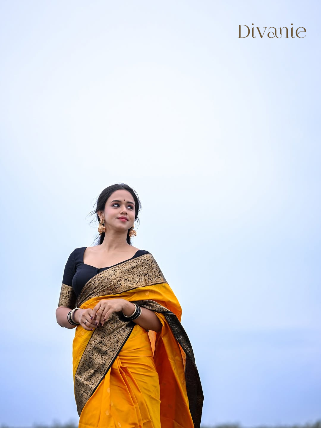 Yellow Silk Saree with Black Zari Border