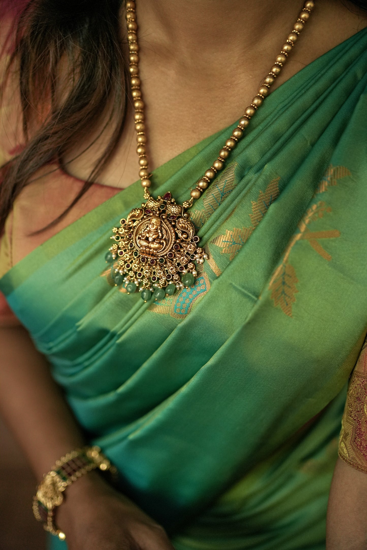Parrot Green Semi Silk Saree with Orange Hue Blouse